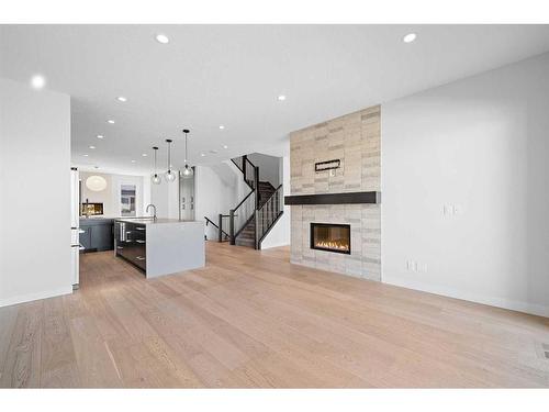 5604 37 Street Sw, Calgary, AB - Indoor Photo Showing Living Room With Fireplace