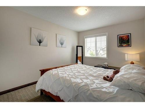 119 Brightoncrest Terrace Se, Calgary, AB - Indoor Photo Showing Bedroom