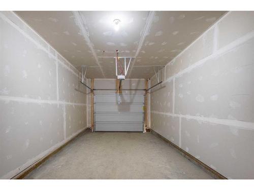 148-2117 81 Street Sw, Calgary, AB - Indoor Photo Showing Garage