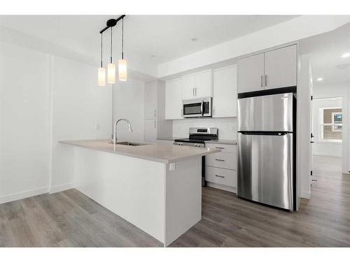 148-2117 81 Street Sw, Calgary, AB - Indoor Photo Showing Kitchen With Upgraded Kitchen