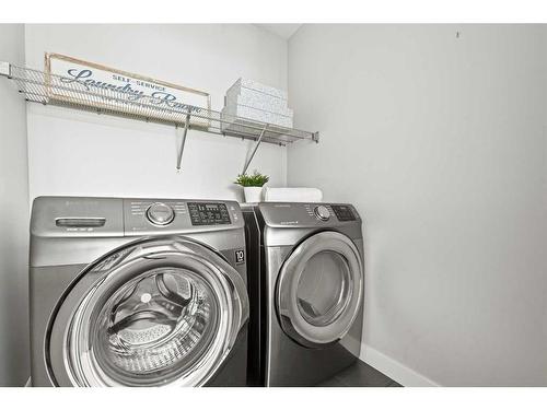 8 Cimarron Springs Circle, Okotoks, AB - Indoor Photo Showing Laundry Room