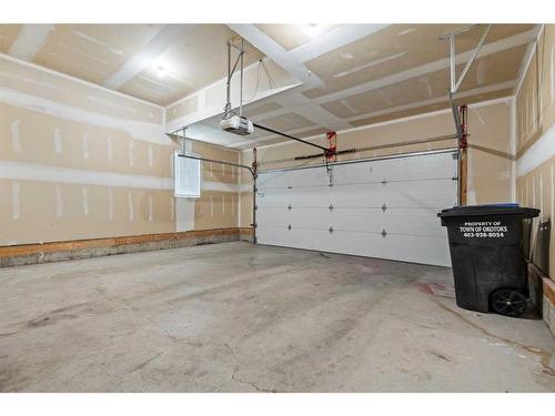 8 Cimarron Springs Circle, Okotoks, AB - Indoor Photo Showing Garage