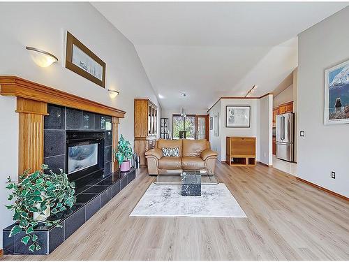 522 Hawkside Mews Nw, Calgary, AB - Indoor Photo Showing Living Room With Fireplace