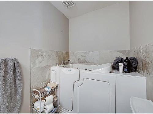 522 Hawkside Mews Nw, Calgary, AB - Indoor Photo Showing Laundry Room