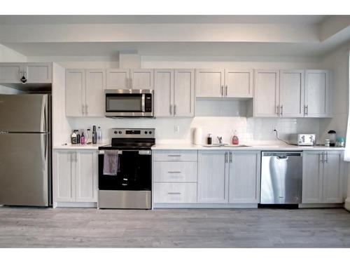 5211-151 Legacy Main Street Se, Calgary, AB - Indoor Photo Showing Kitchen