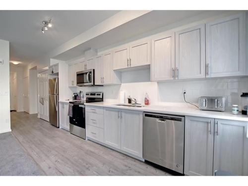 5211-151 Legacy Main Street Se, Calgary, AB - Indoor Photo Showing Kitchen