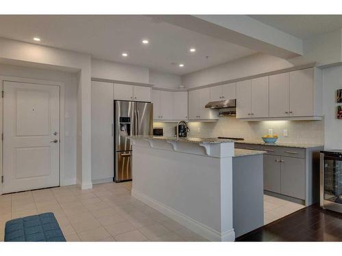 2307-10221 Tuscany Boulevard Nw, Calgary, AB - Indoor Photo Showing Kitchen With Upgraded Kitchen