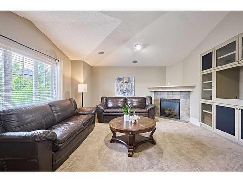 8721 14 Avenue Sw, Calgary, AB - Indoor Photo Showing Living Room With Fireplace