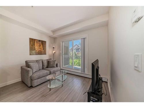 209-15233 1 Street Se, Calgary, AB - Indoor Photo Showing Living Room