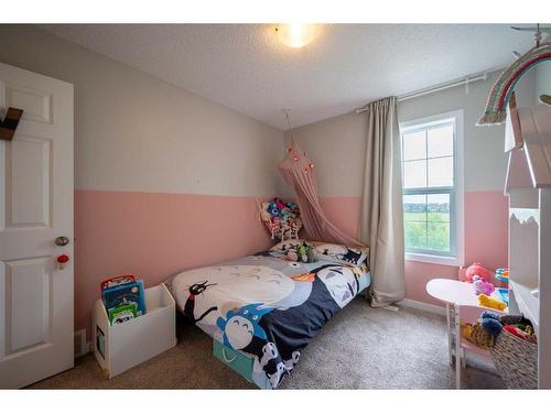 381 Legacy Boulevard Se, Calgary, AB - Indoor Photo Showing Bedroom