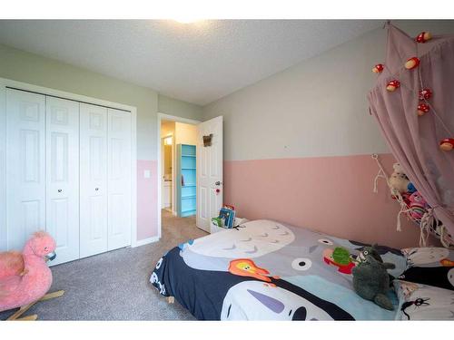 381 Legacy Boulevard Se, Calgary, AB - Indoor Photo Showing Bedroom