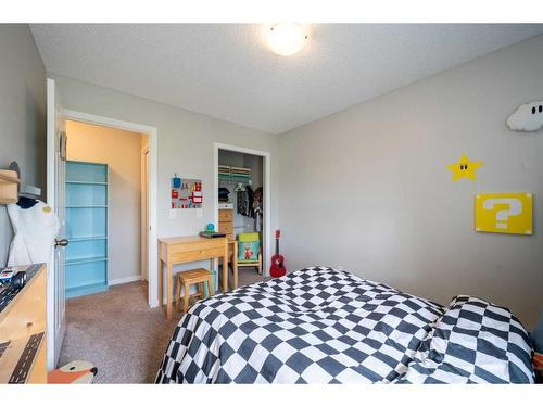 381 Legacy Boulevard Se, Calgary, AB - Indoor Photo Showing Bedroom