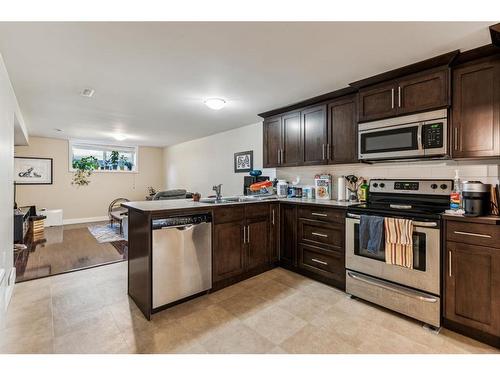 727 Avonlea Place Se, Calgary, AB - Indoor Photo Showing Kitchen With Double Sink