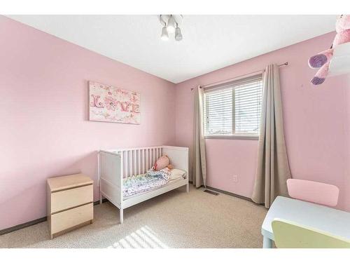 207 Bridlecrest Boulevard Sw, Calgary, AB - Indoor Photo Showing Bedroom