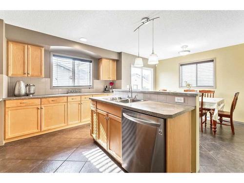 207 Bridlecrest Boulevard Sw, Calgary, AB - Indoor Photo Showing Kitchen With Double Sink
