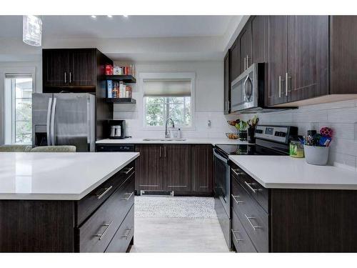 3208-215 Legacy Boulevard Se, Calgary, AB - Indoor Photo Showing Kitchen With Upgraded Kitchen