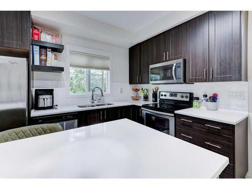3208-215 Legacy Boulevard Se, Calgary, AB - Indoor Photo Showing Kitchen With Double Sink With Upgraded Kitchen