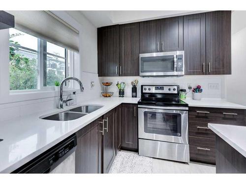 3208-215 Legacy Boulevard Se, Calgary, AB - Indoor Photo Showing Kitchen With Double Sink With Upgraded Kitchen