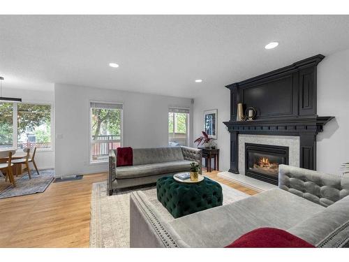 38 Valley Glen Heights Nw, Calgary, AB - Indoor Photo Showing Living Room With Fireplace