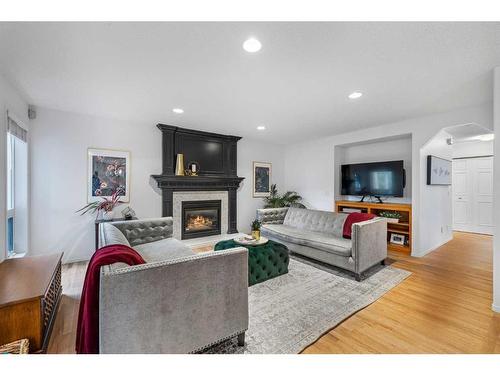 38 Valley Glen Heights Nw, Calgary, AB - Indoor Photo Showing Living Room With Fireplace