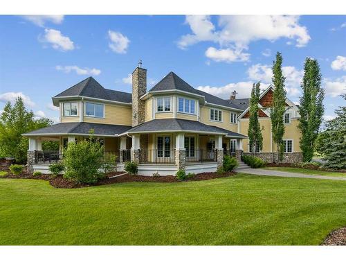 24226 Westbluff Drive, Rural Rocky View County, AB - Outdoor With Deck Patio Veranda With Facade