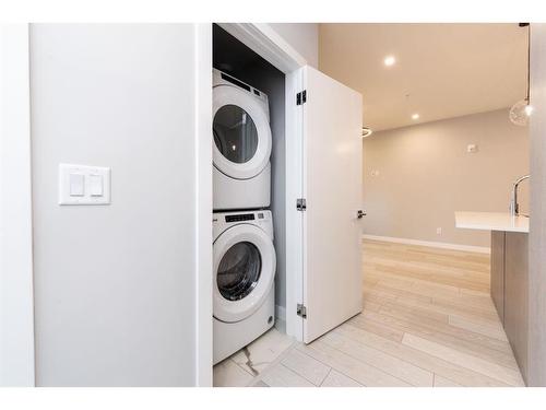 2207-681 Savanna Boulevard Ne, Calgary, AB - Indoor Photo Showing Laundry Room