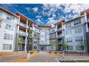 2207-681 Savanna Boulevard Ne, Calgary, AB  - Outdoor With Balcony With Facade 