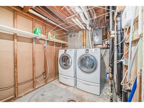 16 Rundlewood Bay Ne, Calgary, AB - Indoor Photo Showing Laundry Room