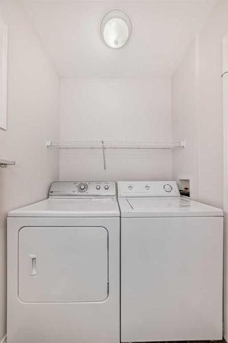 351 Copperfield Boulevard Se, Calgary, AB - Indoor Photo Showing Laundry Room