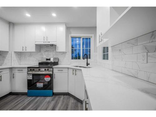 1128 Country Hills Circle Nw, Calgary, AB - Indoor Photo Showing Kitchen With Double Sink