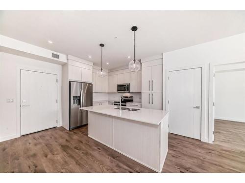 2319-681 Savanna Boulevard Ne, Calgary, AB - Indoor Photo Showing Kitchen With Stainless Steel Kitchen With Upgraded Kitchen