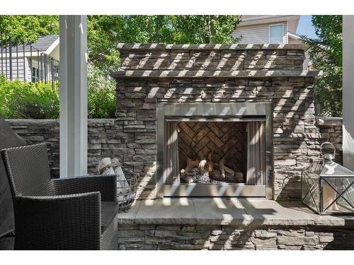 38 Hawkdale Place Nw, Calgary, AB - Outdoor With Fireplace With Deck Patio Veranda