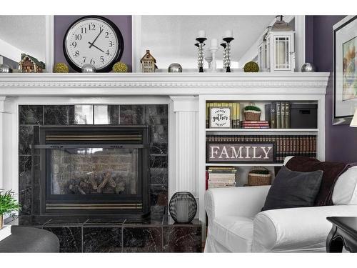 38 Hawkdale Place Nw, Calgary, AB - Indoor Photo Showing Living Room With Fireplace