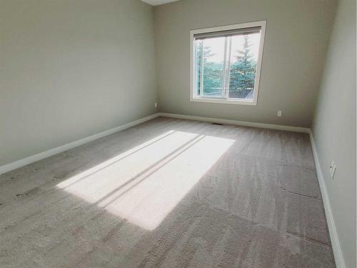 26 Stone Garden Crescent, Carstairs, AB - Indoor Photo Showing Other Room