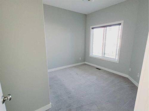 26 Stone Garden Crescent, Carstairs, AB - Indoor Photo Showing Other Room