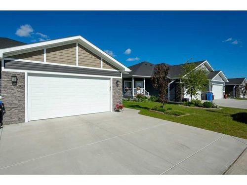 26 Stone Garden Crescent, Carstairs, AB - Outdoor With Facade