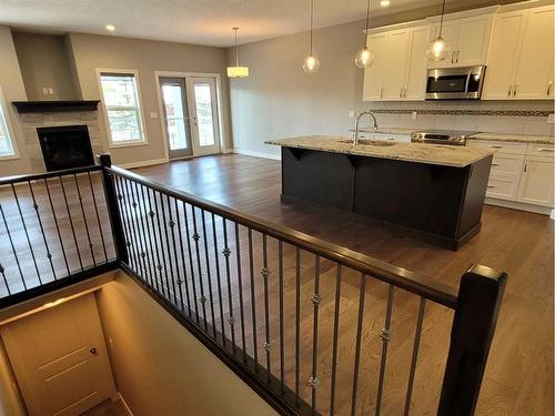 26 Stone Garden Crescent, Carstairs, AB - Indoor Photo Showing Kitchen