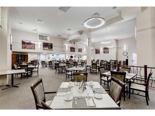 415-2635 Eversyde Avenue Sw, Calgary, AB - Indoor Photo Showing Dining Room