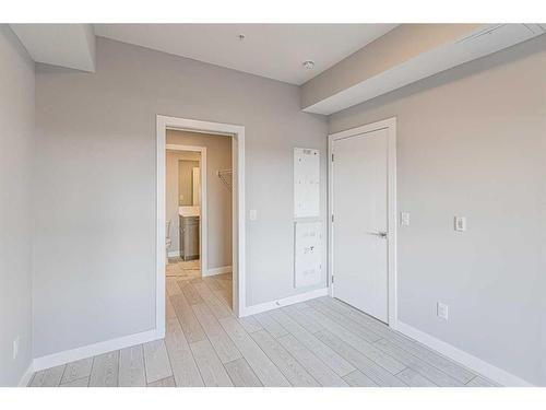 2111-681 Savanna Boulevard Ne, Calgary, AB - Indoor Photo Showing Other Room