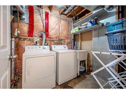 129 Laguna Close Ne, Calgary, AB - Indoor Photo Showing Laundry Room