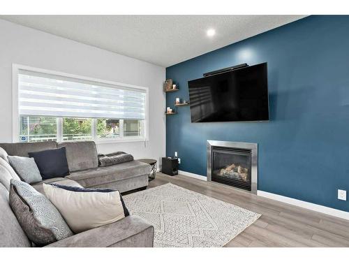 165 Legacy Crescent Se, Calgary, AB - Indoor Photo Showing Living Room With Fireplace