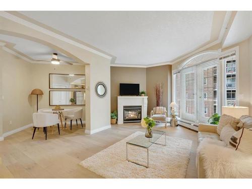 304-1315 12 Avenue Sw, Calgary, AB - Indoor Photo Showing Living Room With Fireplace