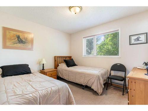 255030 84 Street Ne, Rural Rocky View County, AB - Indoor Photo Showing Bedroom