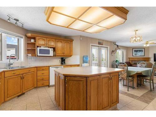 255030 84 Street Ne, Rural Rocky View County, AB - Indoor Photo Showing Kitchen With Double Sink