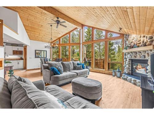 116 Eagle Terrace Road, Canmore, AB - Indoor Photo Showing Living Room With Fireplace