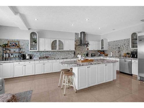 45 Lone Pine Crescent, Rural Rocky View County, AB - Indoor Photo Showing Kitchen With Upgraded Kitchen