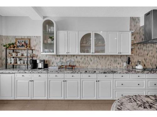 45 Lone Pine Crescent, Rural Rocky View County, AB - Indoor Photo Showing Kitchen With Double Sink