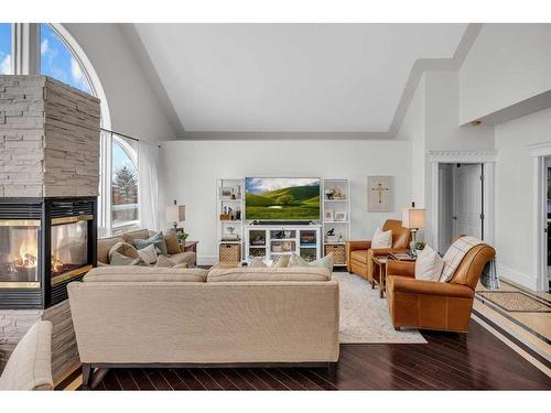 45 Lone Pine Crescent, Rural Rocky View County, AB - Indoor Photo Showing Living Room With Fireplace