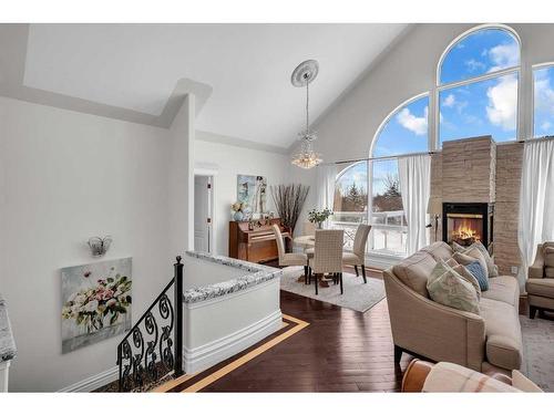 45 Lone Pine Crescent, Rural Rocky View County, AB - Indoor Photo Showing Living Room With Fireplace