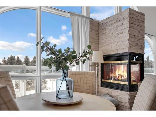 45 Lone Pine Crescent, Rural Rocky View County, AB - Indoor Photo Showing Living Room With Fireplace